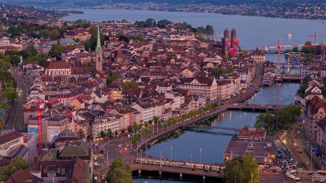 Rooftop bar in a Swiss city with skyline view at night